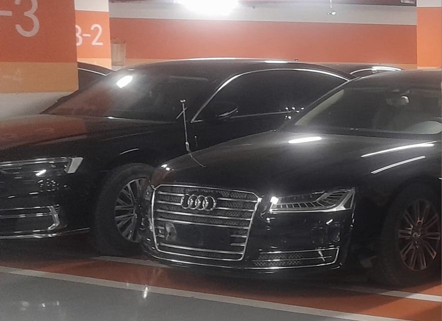 Black Audi A8 diplomatic executive sedan fleet with flag mounts